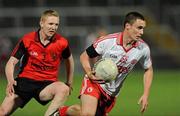 30 March 2011; Shea McGuigan, Tyrone, in action against Paddy Boyle, Down. Cadbury Ulster GAA Football Under 21 Championship Quarter-Final, 2nd Replay, Tyrone v Down, Athletic Grounds, Armagh. Picture credit: Oliver McVeigh / SPORTSFILE