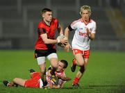 30 March 2011; Ben O'Reilly, Down, in action against Shea McGuigan and Stefan McKenna, Tyrone. Cadbury Ulster GAA Football Under 21 Championship Quarter-Final, 2nd Replay, Tyrone v Down, Athletic Grounds, Armagh. Picture credit: Oliver McVeigh / SPORTSFILE