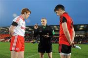 30 March 2011; Referee Barry Cassidy issues instructions to Tyrone captain Peter Harte, left, and Down captain Conor Poland before the start of the game. Cadbury Ulster GAA Football Under 21 Championship Quarter-Final, 2nd Replay, Tyrone v Down, Athletic Grounds, Armagh. Picture credit: Oliver McVeigh / SPORTSFILE