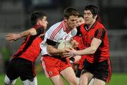 30 March 2011; Niall McKenna, Tyrone, in action against Conor Poland and Anto McArdle, Down. Cadbury Ulster GAA Football Under 21 Championship Quarter-Final, 2nd Replay, Tyrone v Down, Athletic Grounds, Armagh. Picture credit: Oliver McVeigh / SPORTSFILE