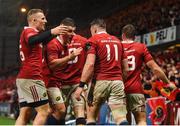 11 November 2016; Ronan O'Mahony of Munster celebrates with team-mates Andrew Conway and Ian Keatley after scoring his side's fourth try during the match between Munster and the New Zealand Maori All Blacks at Thomond Park in Limerick. Photo by Diarmuid Greene/Sportsfile