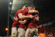11 November 2016; Ronan O'Mahony of Munster celebrates with team-mates Robin Copeland and Jaco Taute after scoring his side's fourth try during the match between Munster and the New Zealand Maori All Blacks at Thomond Park in Limerick. Photo by Diarmuid Greene/Sportsfile