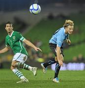 29 March 2011; Stephen Kelly, Republic of Ireland, in action against Diego Forlan, Uruguay. International Friendly, Republic of Ireland v Uruguay, Aviva Stadium, Lansdowne Road, Dublin. Picture credit: David Maher / SPORTSFILE