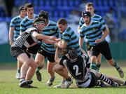 30 March 2011; David Symes, St. Gerard's, is tackled by Denis O'Dwyer, 2, and Colin Moloney, Cistercian College Roscrea. Senior League Final, St. Gerard's v Cistercian College Roscrea, Donnybrook Stadium, Donnybrook, Dublin. Picture credit: Matt Browne / SPORTSFILE