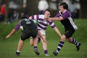 31 March 2011; James Sullivan, Clongowes Wood College SJ, is tackled by Richard Costello, 1, and Kevin Colgan, Terenure College. Senior Seconds Division 1 Final, Terenure College v Clongowes Wood College SJ, Castleknock College, Castleknock, Co. Dublin. Picture credit: Stephen McCarthy / SPORTSFILE