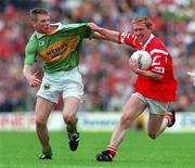 5 July 1998; Aidan Dorgan of Cork in action against Tomás O Sé of Kerry during the Bank of Ireland Munster Senior Football Championship Semi-Final match between Kerry and Cork at Fitzgerald Stadium in Killarney, Kerry. Photo by Brendan Moran/Sportsfile