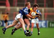 12 October 1997; Brenda McAnespie of Monaghan is tackled by Gearldine O'Ryan of Waterford during the All-Ireland Senior Ladies Football Championship Final between Monaghan and Waterford at Croke Park in Dublin. Photo by Matt Browne/Sportsfile