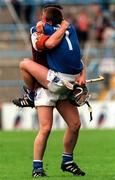 26 July 1998; Waterford goalkeeper Brendan Landers celebrates with team-mate Paul Flynn following the Guinness All-Ireland Senior Hurling Championship Quarter-Final match between Waterford and Galway at Croke Park in Dublin. Photo by Damien Eagers/Sportsfile