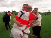 21 June 1998; Calum McGuirk, 7, and his Derry team-mate Garry Briggs celebrate their victory following the Guinness Ulster Senior Hurling Championship Semi-Final match between Derry and Down at Casement Park in Belfast, Antrim. Photo by Damien Eagers/Sportsfile