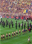 3 September 1995; The Clare team parade behind the Artane Boys Band ahead of the Guinness All-Ireland Senior Hurling Championship Final match between Clare and Offaly at Croke Park in Dublin. Photo by David Maher/Sportsfile