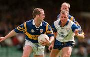 28 June 1998; Conor O'Dwyer of Tipperary in action against Martin Daly of Clare during the Bank of Ireland Munster Senior Football Championship Semi-Final match between Tipperary and Clare at the Gaelic Grounds in Limerick. Photo by Brendan Moran/Sportsfile