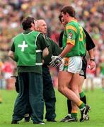 28 June 1998; Meath manager Sean Boylan attends to Darren Fay of Meath after referee Brian White called for attention during the Leinster Senior Football Championship Semi-Final match between Meath and Louth at Croke Park in Dublin. Photo by Ray McManus/Sportsfile