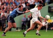 21 June 1998; Eddie MCormack of Kildare in action against Dermot Harrington of Dublin during the Bank of Ireland Leinster Senior Football Championship Quarter-Final Replay match between Kildare and Dublin at Croke Park in Dublin. Photo by David Maher/Sportsfile