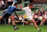 21 June 1998; Eddie McCormack of Kildare is tackled by Dermot Harrington of Dublin during the Bank of Ireland Leinster Senior Football Championship Quarter-Final Replay match between Kildare and Dublin at Croke Park in Dublin. Photo by David Maher/Sportsfile