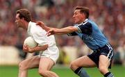 21 June 1998; Eddie McCormack of Kildare is tackled by Mick Deegan of Dublin during the Bank of Ireland Leinster Senior Football Championship Quarter-Final Replay match between Kildare and Dublin at Croke Park in Dublin. Photo by David Maher/Sportsfile