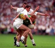 2 August 1998; Enda McManus of Meath in action against Anthony Rainbow, front, and Niall Buckley of Kildare during the Bank of Ireland Leinster Senior Football Championship Final match between Kildare and Meath at Croke Park in Dublin. Photo by Ray McManus/Sportsfile