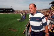 10 August 1997; Clare manager Ger Loughnane walks out ahead of the Guinness All-Ireland Senior Hurling Championship Semi-Final match between Clare and Kilkenny at Croke Park in Dublin. Photo by Brendan Moran/Sportsfile