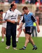 21 June 1998; Dessie Farrell of Dublin with manager Tommy Carr after being sent off by referee Michael Curley during the Bank of Ireland Leinster Senior Football Championship Quarter-Final Replay match between Kildare and Dublin at Croke Park in Dublin. Photo by David Maher/Sportsfile