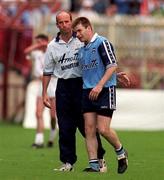 21 June 1998; Dessie Farrell of Dublin with manager Tommy Carr after being sent off by referee Michael Curley during the Bank of Ireland Leinster Senior Football Championship Quarter-Final Replay match between Kildare and Dublin at Croke Park in Dublin. Photo by David Maher/Sportsfile