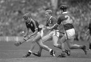4 September 1988; Michael &quot;Hopper&quot; McGrath of Galway in action against Aidan Ryan and John Heffernan of Tipperary during the All-Ireland Senior Hurling Championship Final match between Galway and Tipperary at Croke Park in Dublin. Photo by Ray McManus/Sportsfile