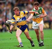 3 September 1995; Jamesie O'Connor of Clare is tackled by Michael Duignan of Offaly during the Guinness All-Ireland Senior Hurling Championship Final between Clare and Offaly at Croke Park in Dublin. Photo by Ray McManus/Sportsfile
