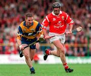 21 June 1998; Jamesie O'Connor of Clare in action against Brian Corcoran of Cork during the Guinness Munster Senior Hurling Championship Semi-Final match between Clare and Cork at Semple Stadium in Thurles, Tipperary. Photo by Ray McManus/Sportsfile