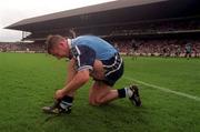 21 June 1998; Jim Gavin of Dublin ties his laces prior to the Bank of Ireland Leinster Senior Football Championship Quarter-Final Replay match between Kildare and Dublin at Croke Park in Dublin. Photo by David Maher/Sportsfile