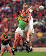 3 August 1997. John McDermott and Jimmy McGuinness (8) of Meath go up for the ball against Declan Kerrigan of Kildare during the Bank of Ireland Leinster Senior Football Championship Semi-Final Second Replay match between Meath and Kildare at Croke Park in Dublin. Photo by Ray McManus/Sportsfile