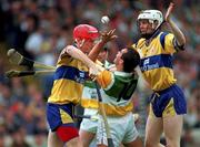 3 September 1995; Johnny Dooley of Offaly is tackled by Brian Lohan , left, and Frank Lohan of Clare during the All-Ireland Senior Hurling Championship Final match between Clare and Offaly at Croke Park in Dublin. Photo by Ray McManus/Sportsfile