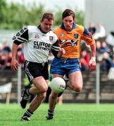 28 June 1998; Ken Killeen of Sligo in action against Clifford McDonald of Roscommon during the Bank of Ireland Connacht Senior Football Championship Semi-Final match between Roscommon and Sligo at Dr Hyde Park in Roscommon. Photo by Matt Browne/Sportsfile