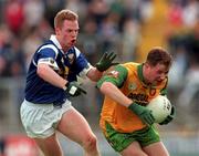 21 June 1998; Manus Boyle of Donegal in action against Anthony Forde of Cavan during the Bank of Ireland Ulster Senior Football Championship Semi-Final match between Cavan and Donegal at St Tiernach's Park in Clones, Monaghan. Photo by Matt Browne/Sportsfile