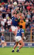 21 June 1998; Dermot McCabe with the support of his Cavan team-mate Gerry Sheridan, 3, in action against Manus Boyle and John Gildea of Donegal during the Bank of Ireland Ulster Senior Football Championship Semi-Final match between Cavan and Donegal at St Tiernach's Park in Clones, Monaghan. Photo by Matt Browne/Sportsfile