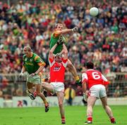 28 June 1998; John McDermott of Meath in action against Ken Reilly of Louth with Graham Geraghty of Meath, left, and John Donaldson of Meath, 6, looking on during the Leinster Senior Football Championship Semi-Final match between Meath and Louth at Croke Park in Dublin. Photo by Ray McManus/Sportsfile