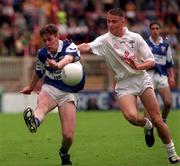 28 June 1998; Kieran Kelly of Laois in action against Michael Wright of Kildare during the Leinster Minor Football Championship Semi-Final match between Laois and Kildare at Croke Park in Dublin. Photo by Ray McManus/Sportsfile
