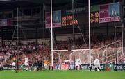 2 August 1998; Kildare substitute Bryan Murphy shoots past Meath goalkeeper Conor Martin and defender Donal Curtis to score his side's goal during the Bank of Ireland Leinster Senior Football Championship Final match between Kildare and Meath at Croke Park in Dublin. Photo by Ray McManus/Sportsfile