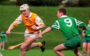 21 June 1998; Malachy Molloy of Antrim in action against Pat Jordan of London during the Guinness Ulster Senior Hurling Championship Semi-Final Replay match between Antrim and London at Casement Park in Belfast, Antrim. Photo by Damien Eagers/Sportsfile