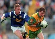 21 June 1998; Manus Boyle of Donegal in action against Anthony Forde Cavan during the Bank of Ireland Ulster Senior Football Championship Semi-Final match between Cavan and Donegal at St Tiernach's Park in Clones, Monaghan. Photo by Matt Browne/Sportsfile
