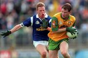 21 June, 1998; Manus Boyle of Donegal in action against Anthony Forde of Cavan during the Bank of Ireland Ulster Senior Football Championship Semi-Final match between Cavan and Donegal at St Tiernach's Park in Clones, Monaghan. Photo by Matt Browne/Sportsfile