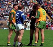 21 June 1998; Martin Coll of Donegal has his name taken before being sent off by referee Martin McBrien during the Bank of Ireland Ulster Senior Football Championship Semi-Final match between Cavan and Donegal at St Tiernach's Park in Clones, Monaghan. Photo by Ray Lohan/Sportsfile