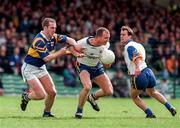 28 June 1998; Martin Daly and Johnny Enright, right, of Clare in action against Conor O'Dwyer of Tipperary during the Bank of Ireland Munster Senior Football Championship Semi-Final match between Tipperary and Clare at the Gaelic Grounds in Limerick. Photo by Brendan Moran/Sportsfile