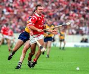 21 June 1998; Michael Daly of Cork in action against Sean McMohan of Clare during the Guinness Munster Senior Hurling Championship Semi-Final match between Clare and Cork at Semple Stadium in Thurles, Tipperary. Photo by Brendan Moran/Sportsfile