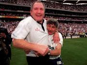 2 August 1998; Kildare manager Mick O'Dwyer celebrates with his selector Pat McCarthy, left, after victory in the Bank of Ireland Leinster Senior Football Championship Final match between Kildare and Meath at Croke Park in Dublin. Photo by Ray McManus/Sportsfile