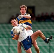 28 June 1998; Padraig Gallagher of Clare in action against Peter Lambert of Tipperary during the Bank of Ireland Munster Senior Football Championship Semi-Final match between Tipperary and Clare at the Gaelic Grounds in Limerick. Photo by Brendan Moran/Sportsfile