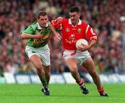 5 July 1998; Pat Hegarty of Cork in action against Donal Daly of Kerry during the Bank of Ireland Munster Senior Football Championship Semi-Final match between Kerry and Cork at Fitzgerald Stadium in Killarney, Kerry. Photo by Brendan Moran/Sportsfile