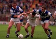 28 June 1998; Pat Moolick of Kildare in action against Brian Fitzpatrick, left, and Jamie Moran, right, of Laois during the Leinster Minor Football Championship Semi-Final match between Laois and Kildare at Croke Park in Dublin. Photo by Ray McManus/Sportsfile