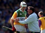 14 June 1998; Offaly manager Michael &quot;Babs&quot; Keating with Gary Hannify during the Guinness Leinster Senior Hurling Championship Semi-Final match between Offaly and Wexford at Croke Park in Dublin. Photo by Ray McManus/Sportsfile