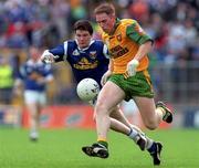 21 June, 1998; Noel McGinley of Donegal is tackled by Larry Reilly of Cavan during the Bank of Ireland Ulster Senior Football Championship Semi-Final match between Cavan and Donegal at St Tiernach's Park in Clones, Monaghan. Photo by Matt Browne/Sportsfile