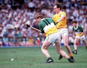 6 August 1989; Daithi Regan of Offaly in action against Dominic McKinley of Antrim during the All-Ireland Senior Hurling Championship Semi-Final match between Antrim and Offaly in at Croke Park in Dublin. Photo by Ray McManus/Sportsfile