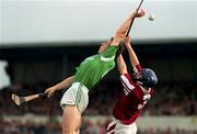 5 October 1997; Ollie Moran of Limerick in action against Liam Hodgins of Galway during the Church & General National Hurling League Final match between Limerick and Galway at Cusack Park in Ennis, Clare. Photo by Brendan Moran/Sportsfile