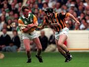 5 July 1998; Kilkenny's Pat O'Neill is tackled by Offaly's John Ryan during the Guinness Leinster Senior Hurling Championship Final between Kilkenny and Offaly at Croke Park in Dublin. Photo by Ray Lohan/Sportsfile